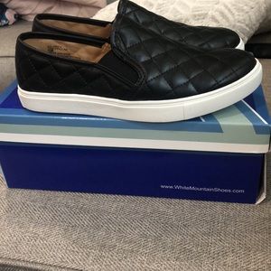 Women’s size 81/2 never worn slip ons still in box